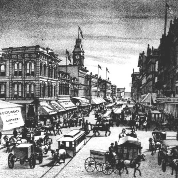 Black and white drawing of old Portland with horse-drawn carriages.